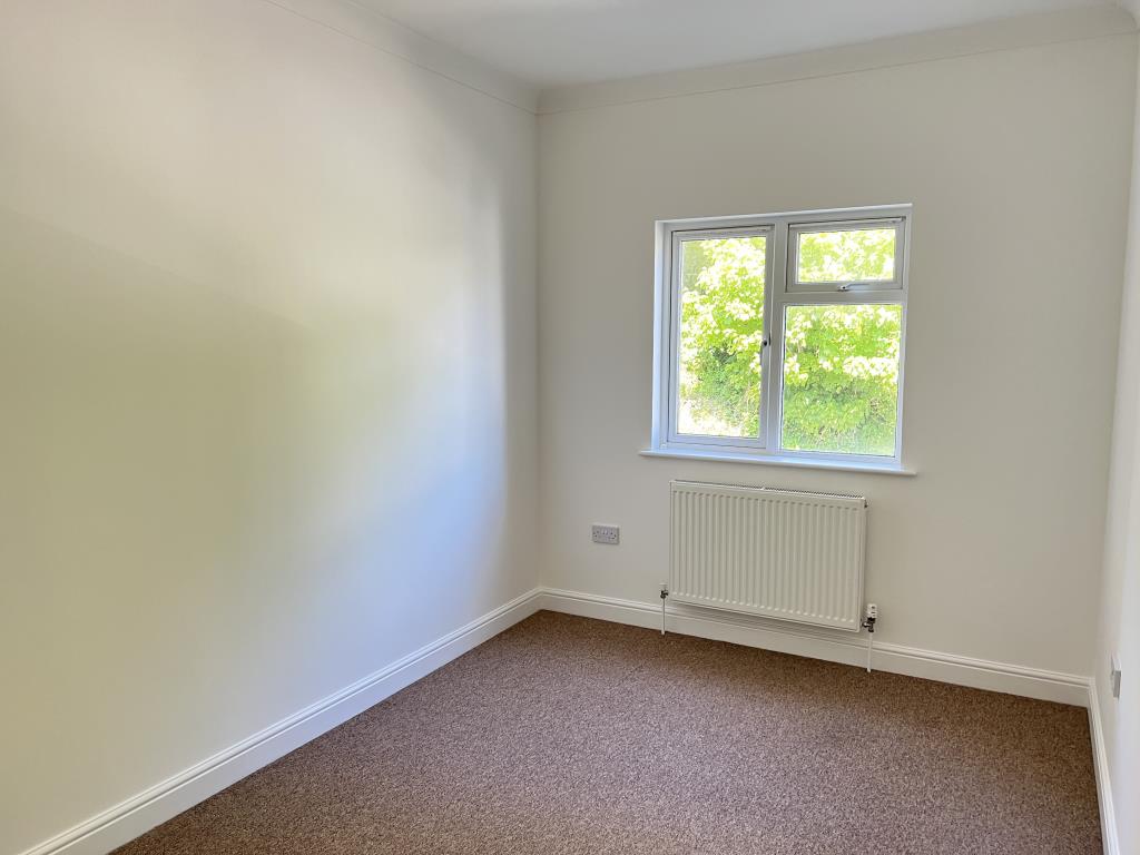 Lot: 6 - TWO-BEDROOM FLAT FOR INVESTMENT OR OCCUPATION - Double bedroom overlooking allocated parking spaces